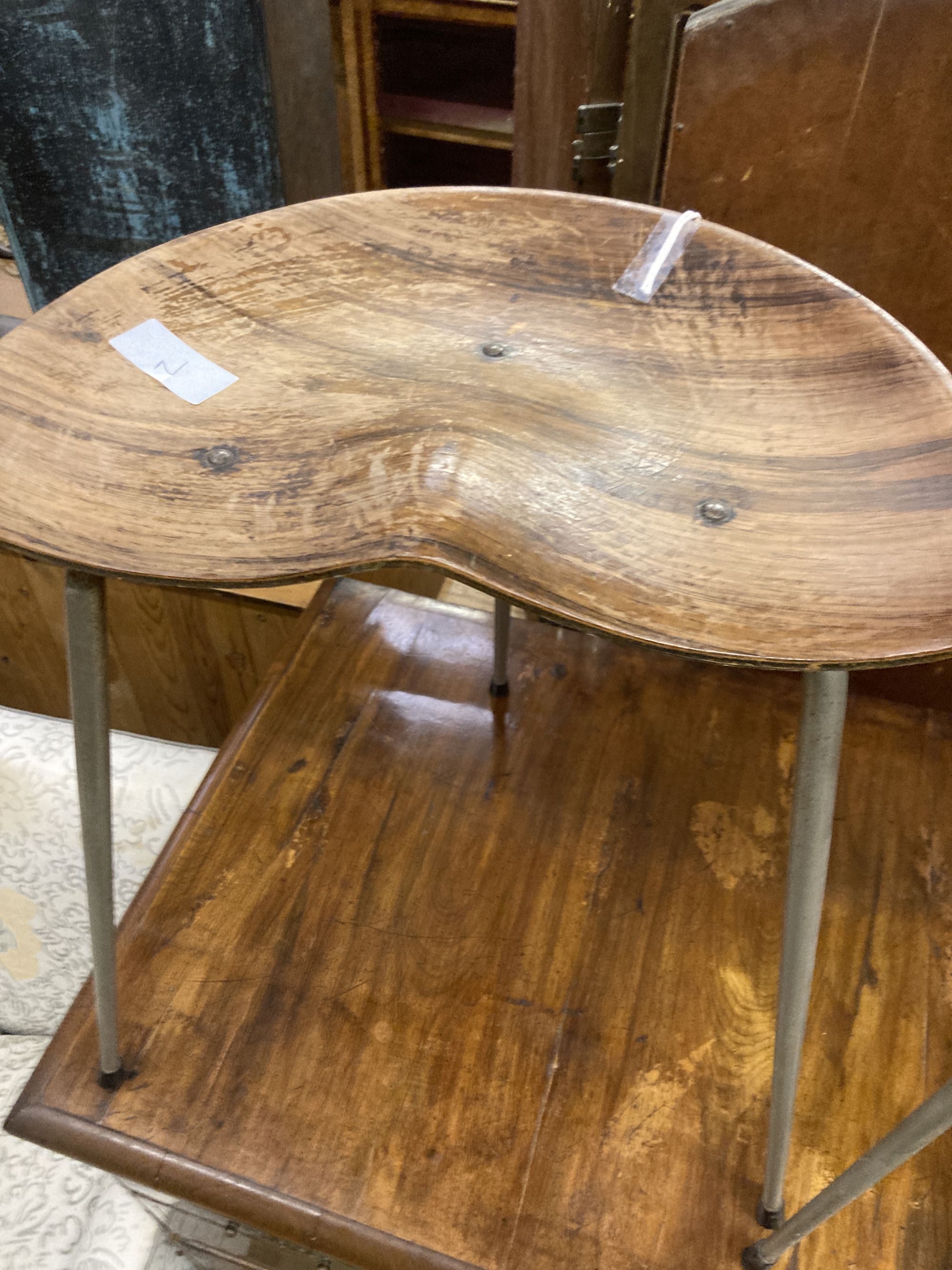 A pair of Arne Jacobsen-style saddle seat stools, width 39cm, depth 25cm, height 48cm